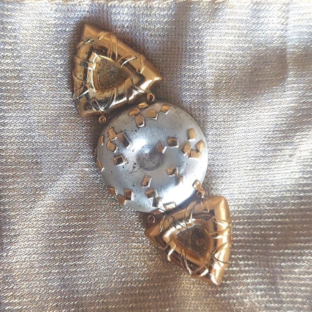 Silver and gold pin